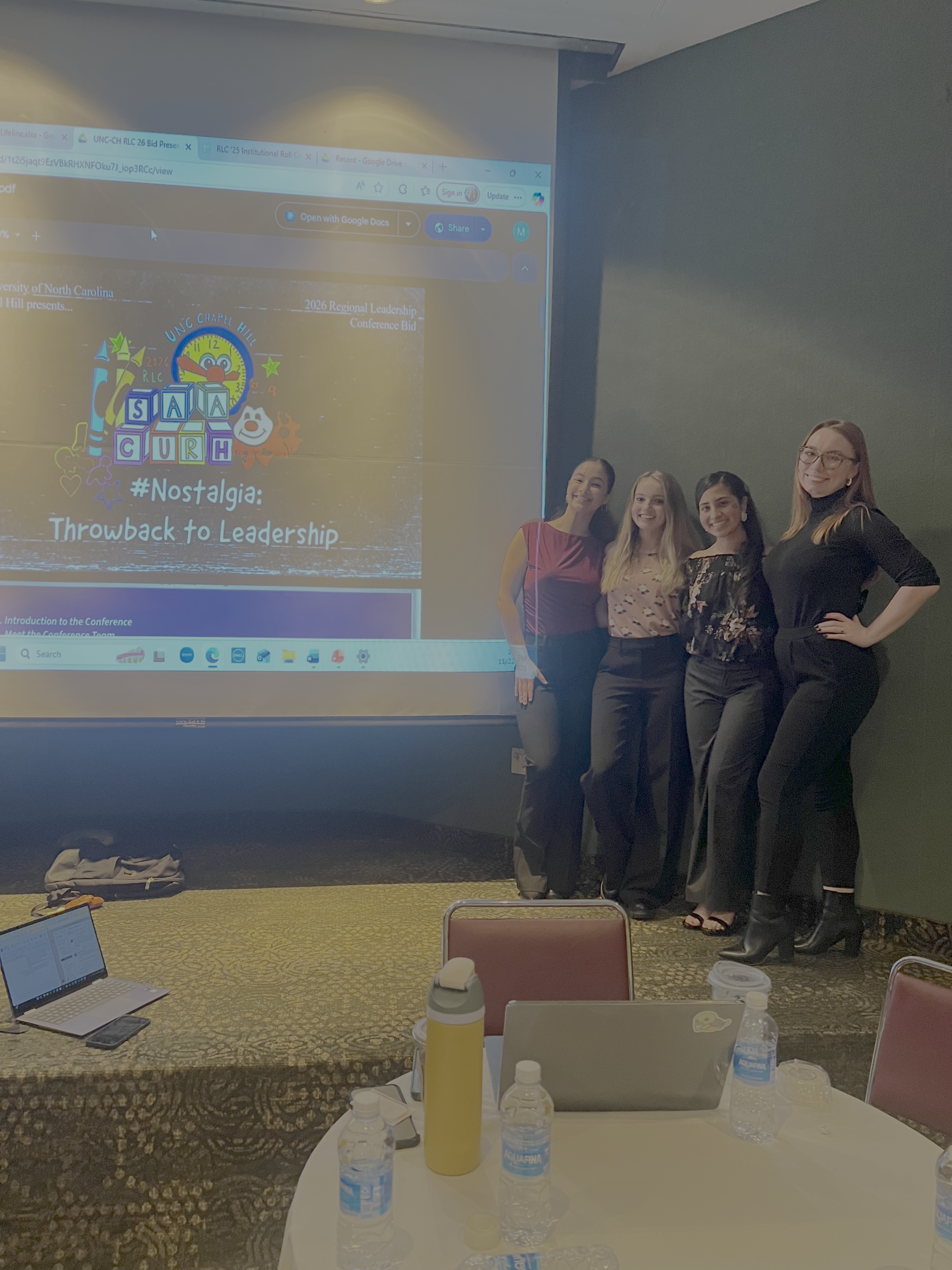 Ilia presenting at a conference.